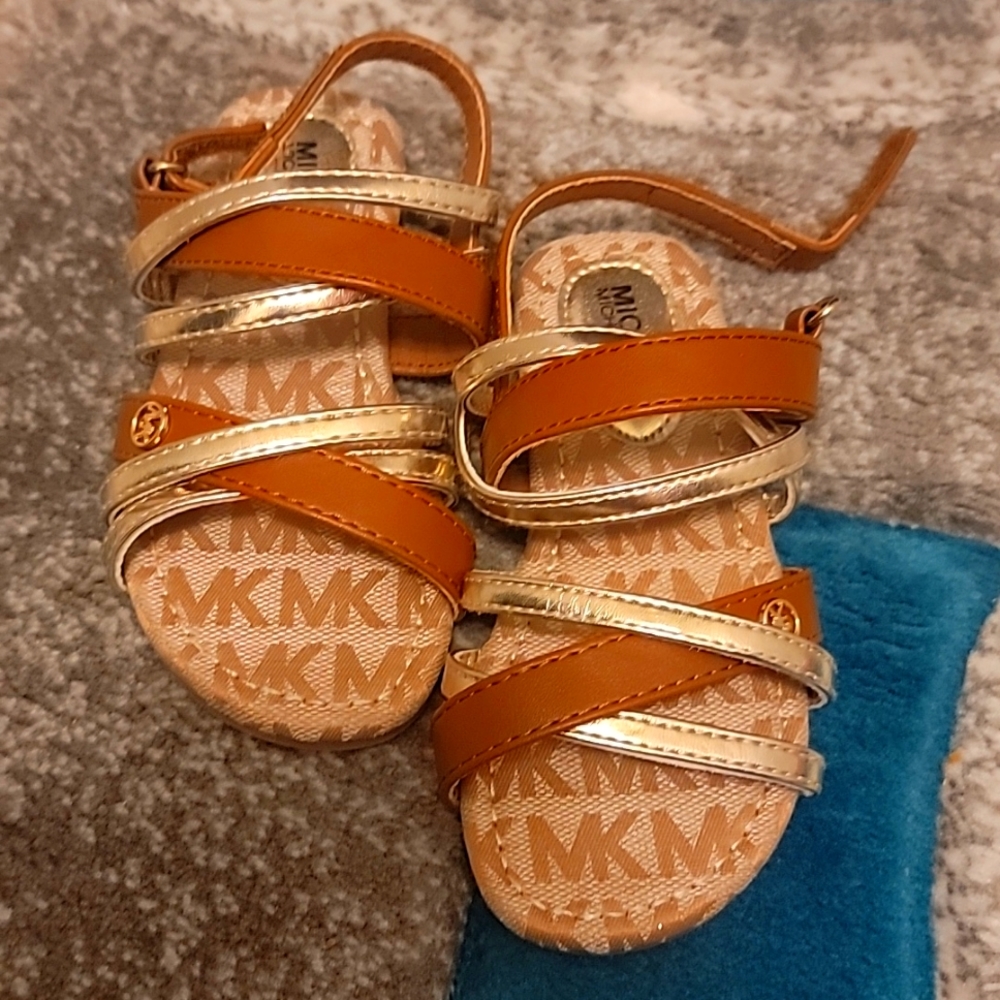 Michael kors toddler sandals never worn brand new. Size 9